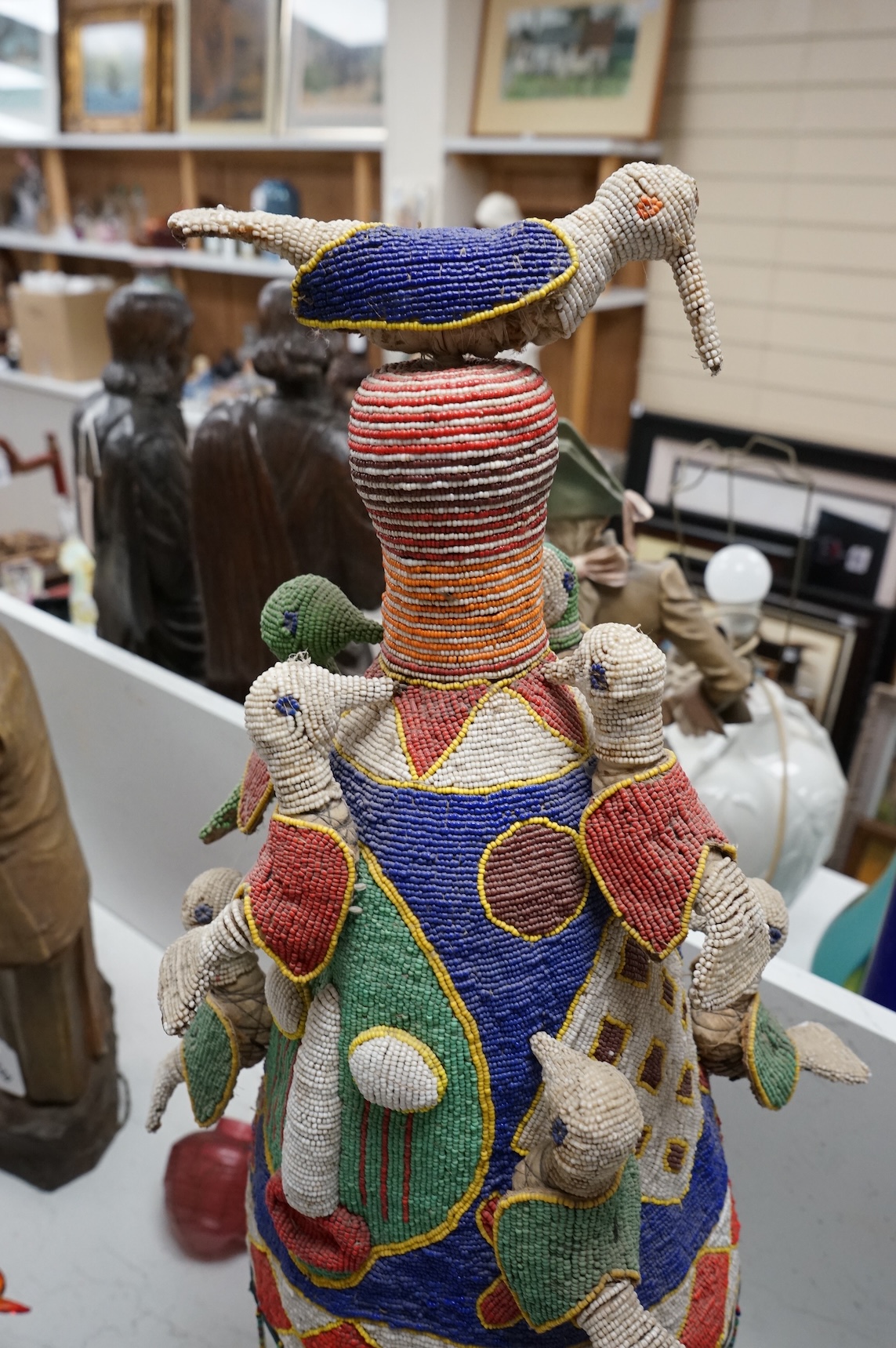 Tribal interest - West African Yoruba beaded crown on stand, 78cm high